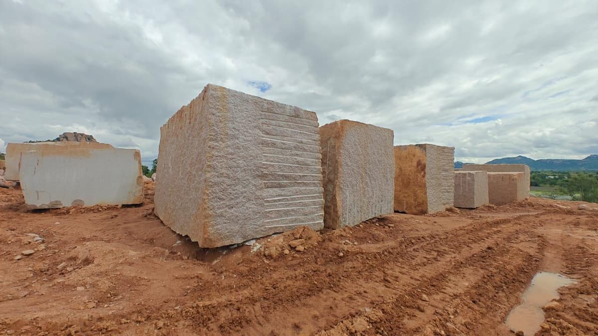 Quarry blocks with the Karnataka hills behind